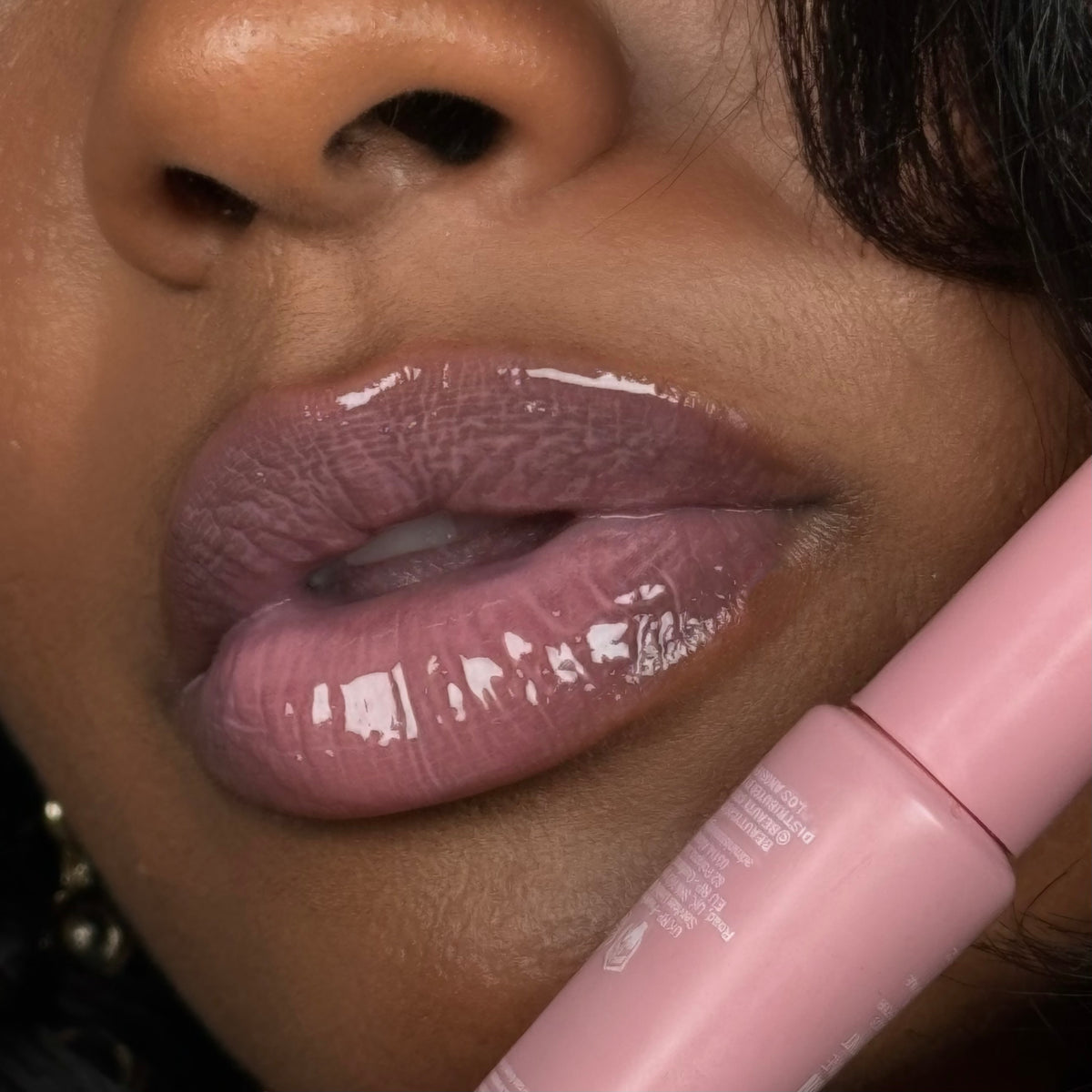 Peptide Lip Treatment applicator and glossy finish detail